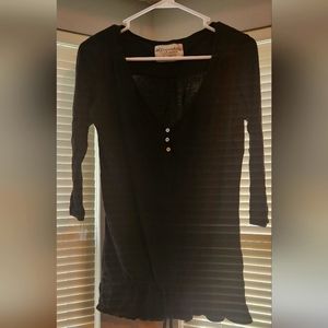 Long sleeve black women's top.
